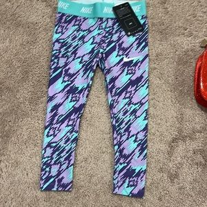 Nike girls size 4 running pant. NWT